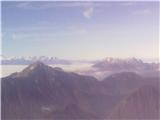 desno Triglav z V Julijskimi Alpami, Karavankami in KSA s Storžičem
